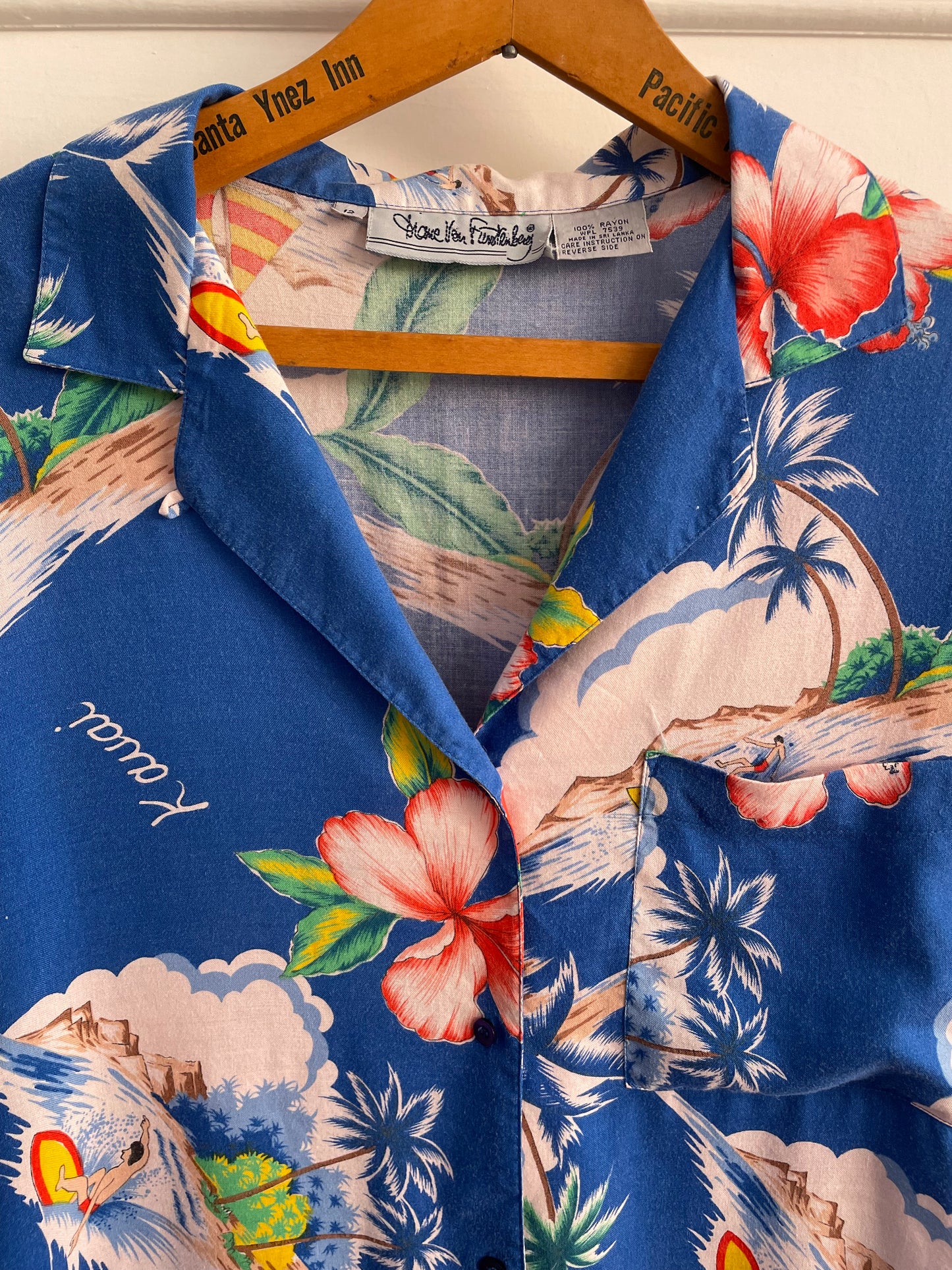 the close up of DVF Diane von Furstenberg vintage 80s Hawaiian shirt. with a royal blue color