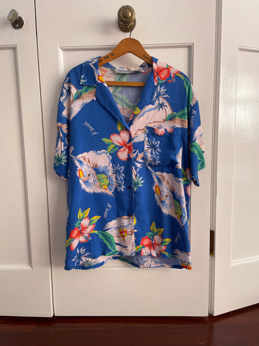 Front look of DVF Diane von Furstenberg vintage 80s Hawaiian shirt. with a royal blue color