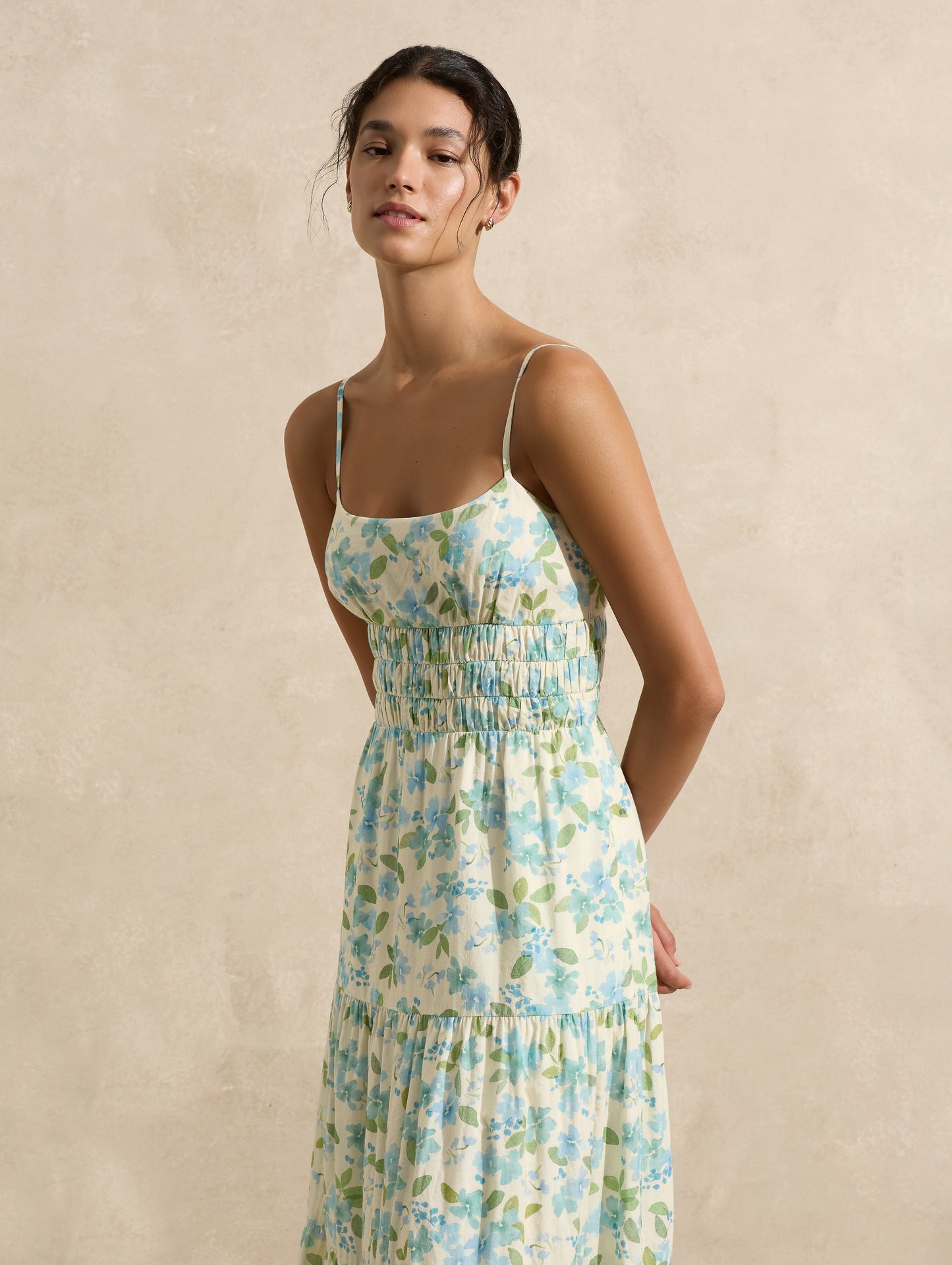 the Peony Swimwear Tiered Maxi Dress in watercolour floral