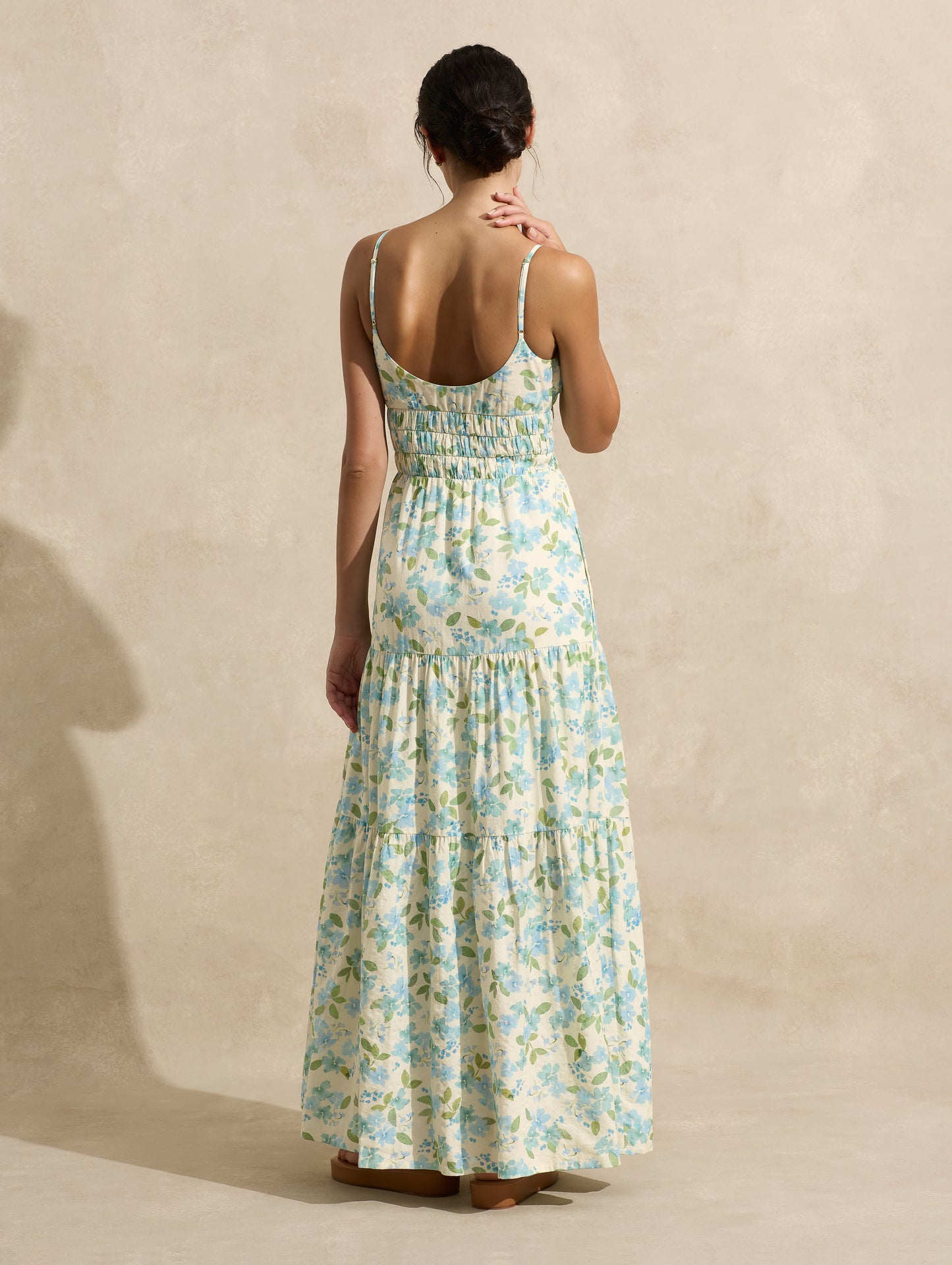 the Peony Swimwear Tiered Maxi Dress in watercolour floral