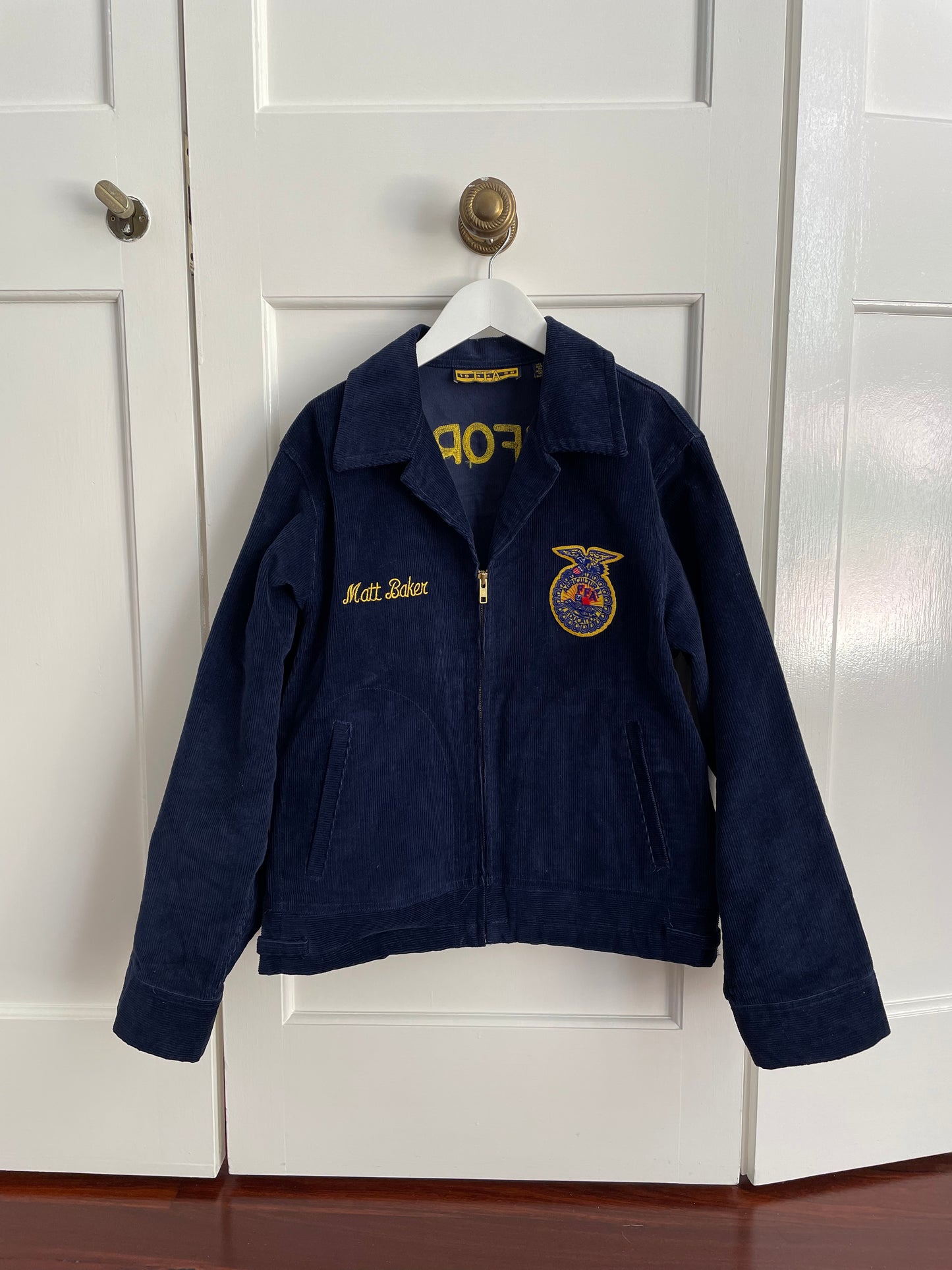 Vintage California FFA (Future Farmers of America) corduroy jacket from the 90s. Embroidery "California Sonora" and "Matt Baker" at left chest. FFA patches on both front and back